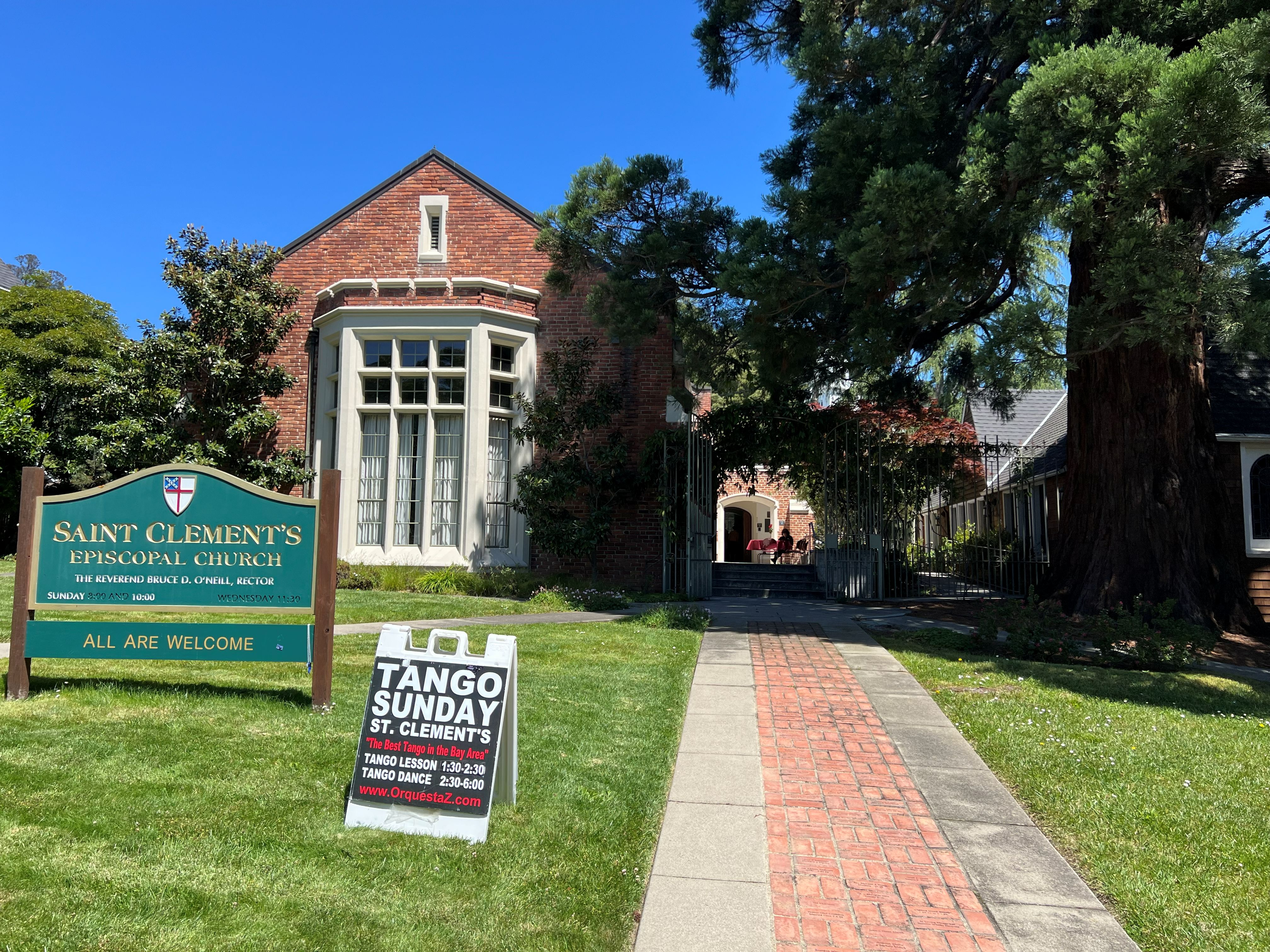 Exterior view of St. Clement's Episcopal Church in Berkeley on a sunny afternoon.