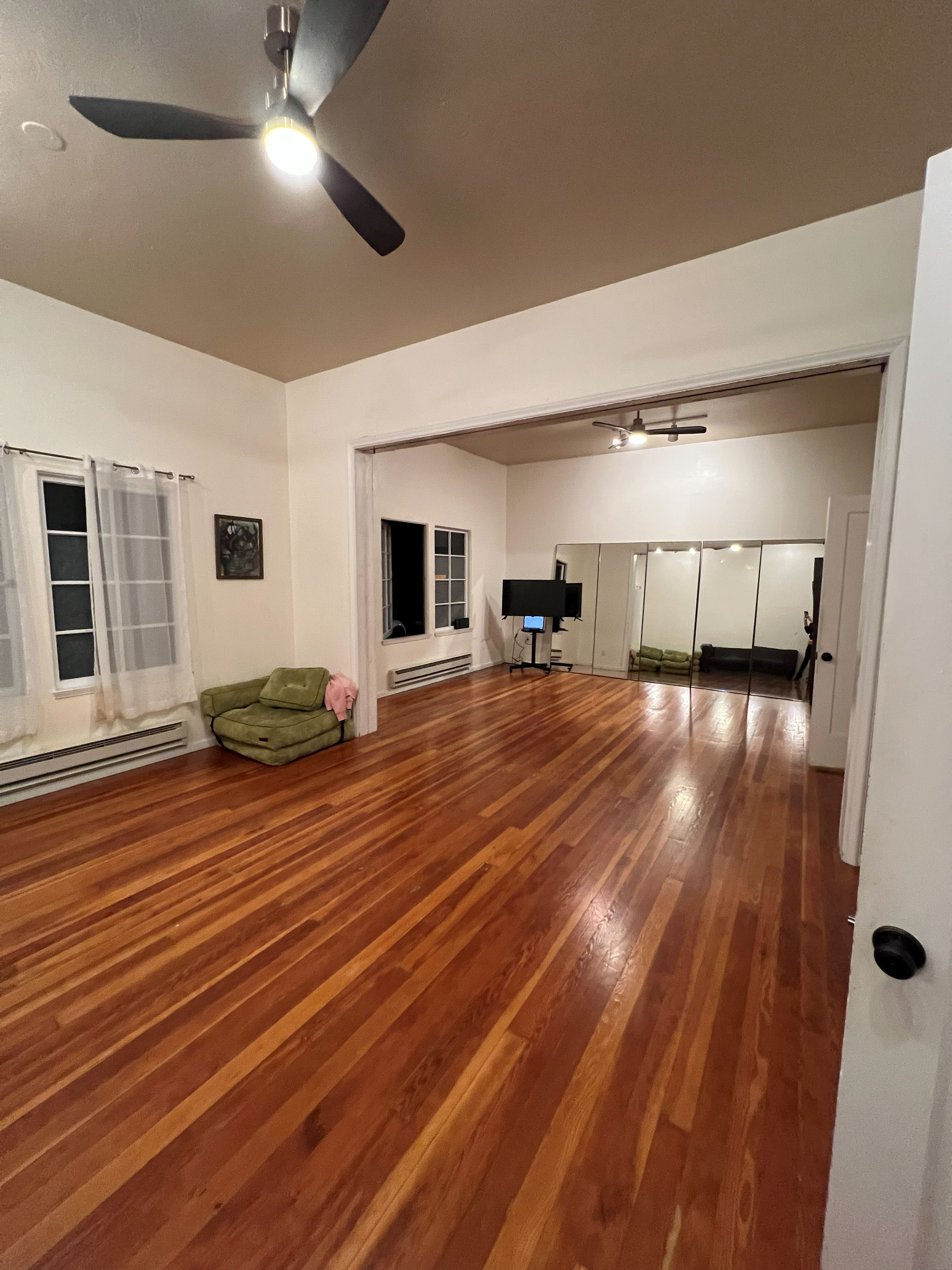 Exterior side view of The Oak Grove on 37th Street with the Omni studio entry circled.